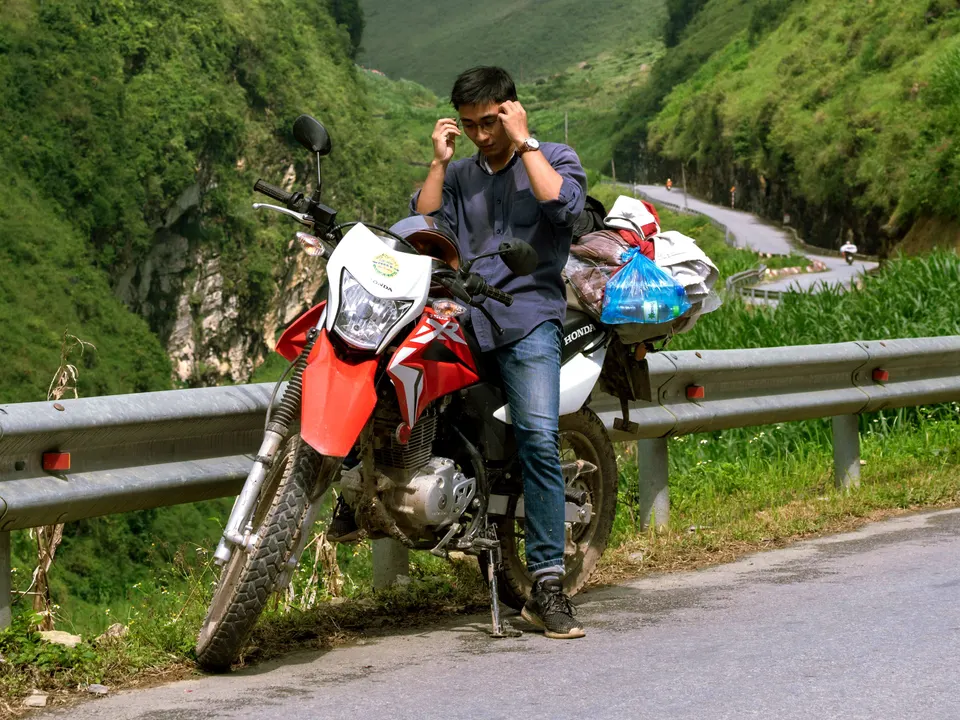 Rider with a Honda XR on a Ha Giang mountain road